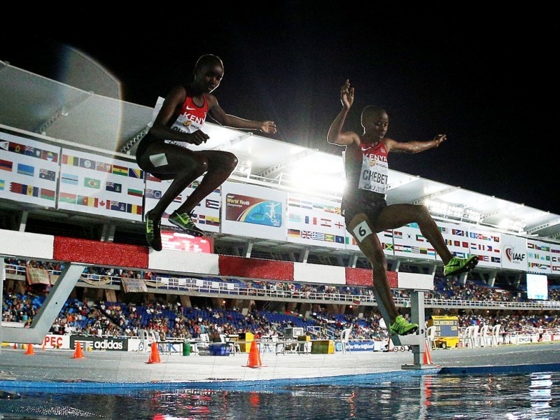 Celliphine Chepteek Chespol and Sandrafelis Chebet Tuei of Kenya in action during the Girls 2000 Meters Steeplechase final on day three of the IAAF World Youth   Championships, Cali 2015 on July 17, 2015 at the Pascual Guerrero Olympic Stadium in Cali, Colombia. (Photo by Patrick Smith/Getty Images for IAAF)