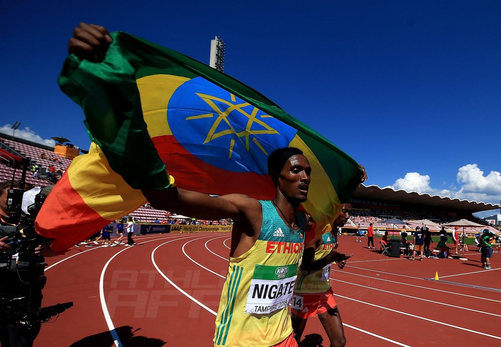 Takele Nigate of Ethiopia celebrates winning the men's 3000m steeplechase at the IAAF World U20 Championships Tampere 2018 / Photo Credit: Getty for the IAAF